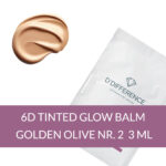 Picture of a sample of DDIFFERENCE Tinted Glow Balm and a blob of color in the shade of golden olive number two