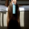 Flowing hair with mask Liquid hair mask, flash balm for all hair types, hybrid conditioner with natural cloudberry extract, biotin, niacinamide gives shine smoothness, hydration, extends time between washes. In blue pump bottle.