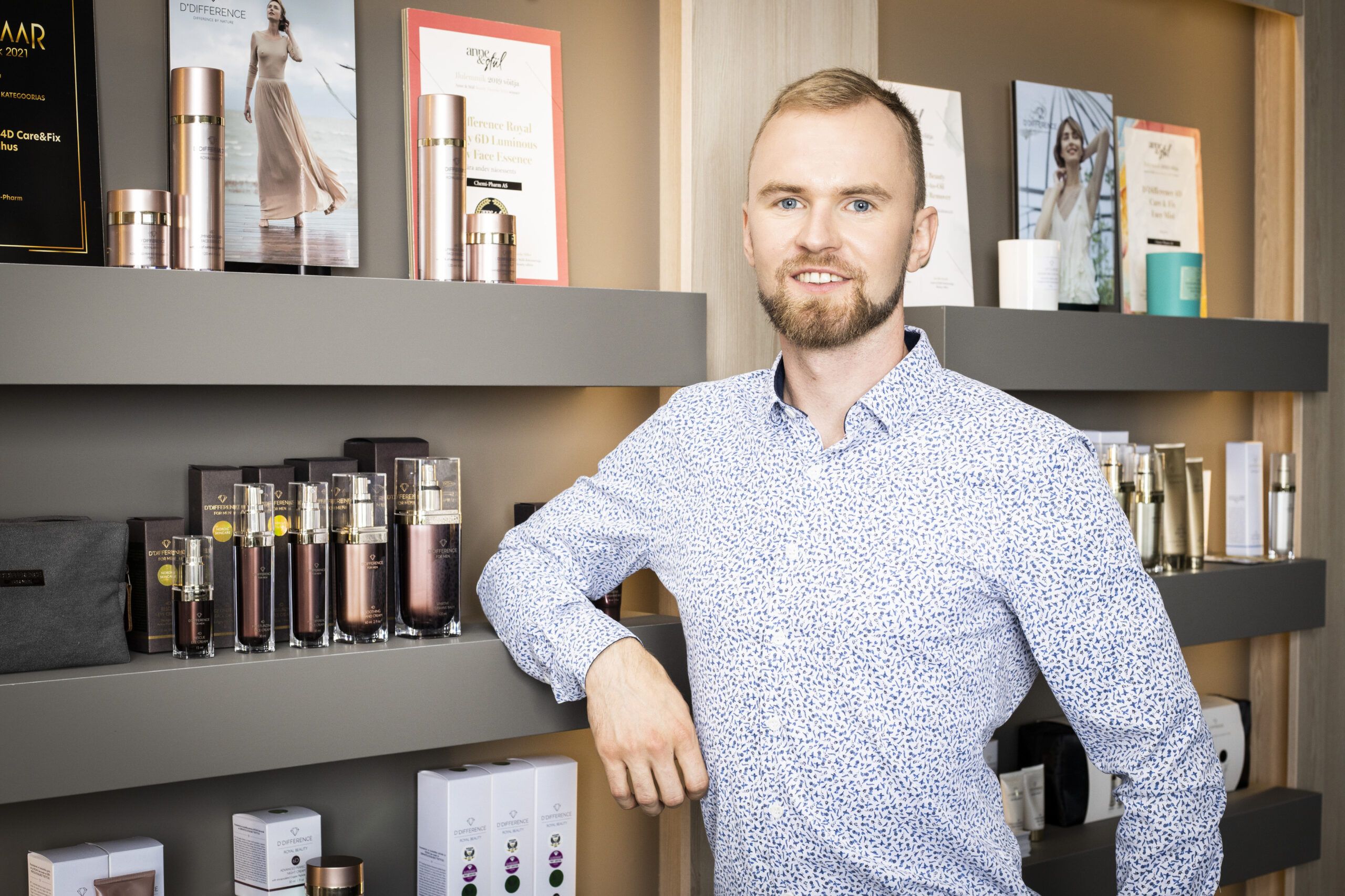 Justin in front of product display